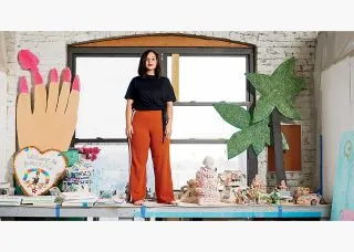 Yvette Mayorga with artwork