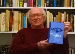 Ed Zagorski holding book