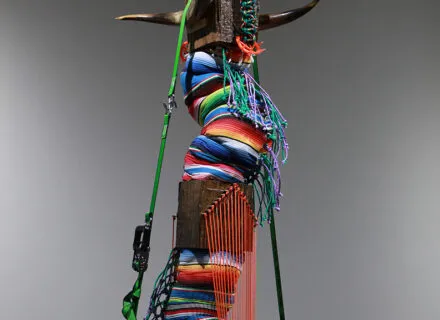 Photo of a colorful vertical multimedia sculpture
