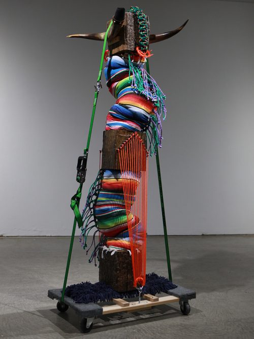 Photo of a colorful vertical multimedia sculpture