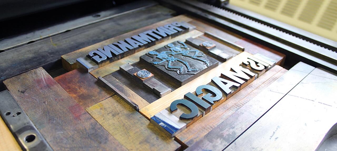 View of relief blocks on a printing press