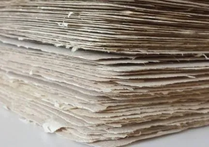 Closeup of a stack of handmade natural papers