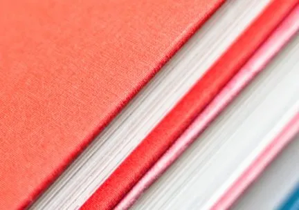 Closeup of the edges of colorful hardcover books