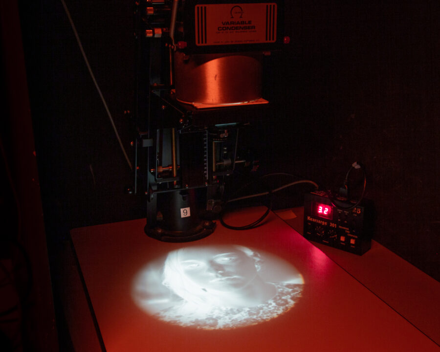 enlarger displaying a negative of a student portrait