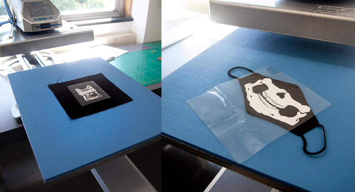 fabric with vinyl and application tape on the lower platen