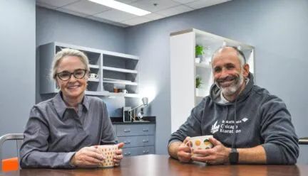 Deana McDonagh and Adam Bleakney at (dis)Ability Design Studio/table w/coffee