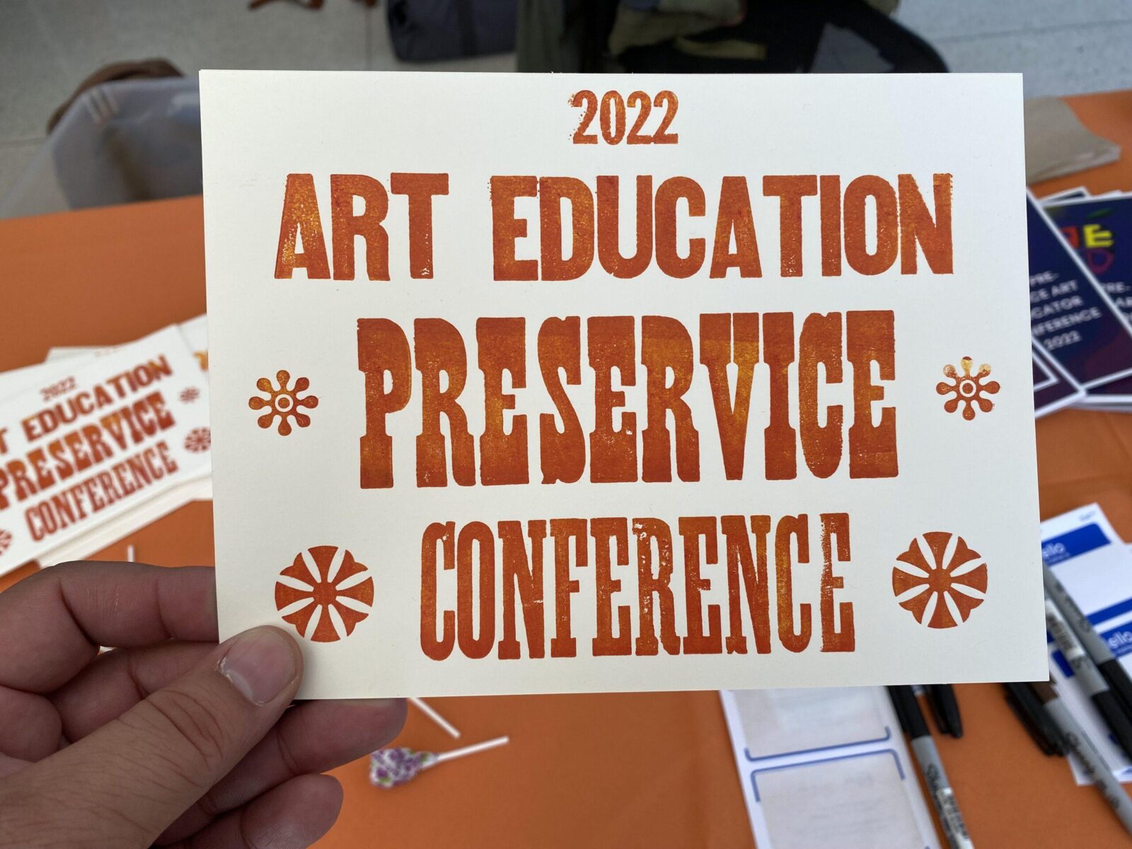 a letter press print that says "Art Education Preservice Conference"