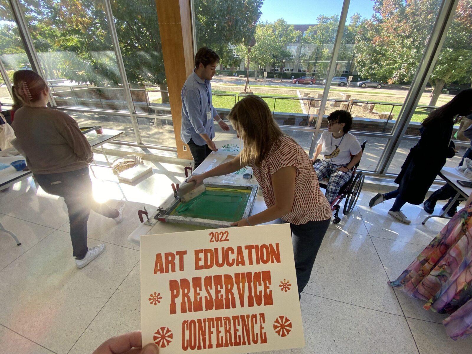 students pulling prints with a screen