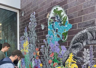 students working on mural