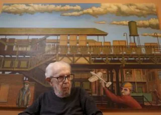 Leo Segedin in front of painting
