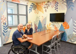 McDonagh and Bleakney at table