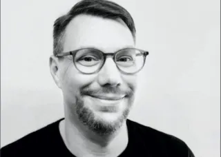 smiling Eric Benson portrait