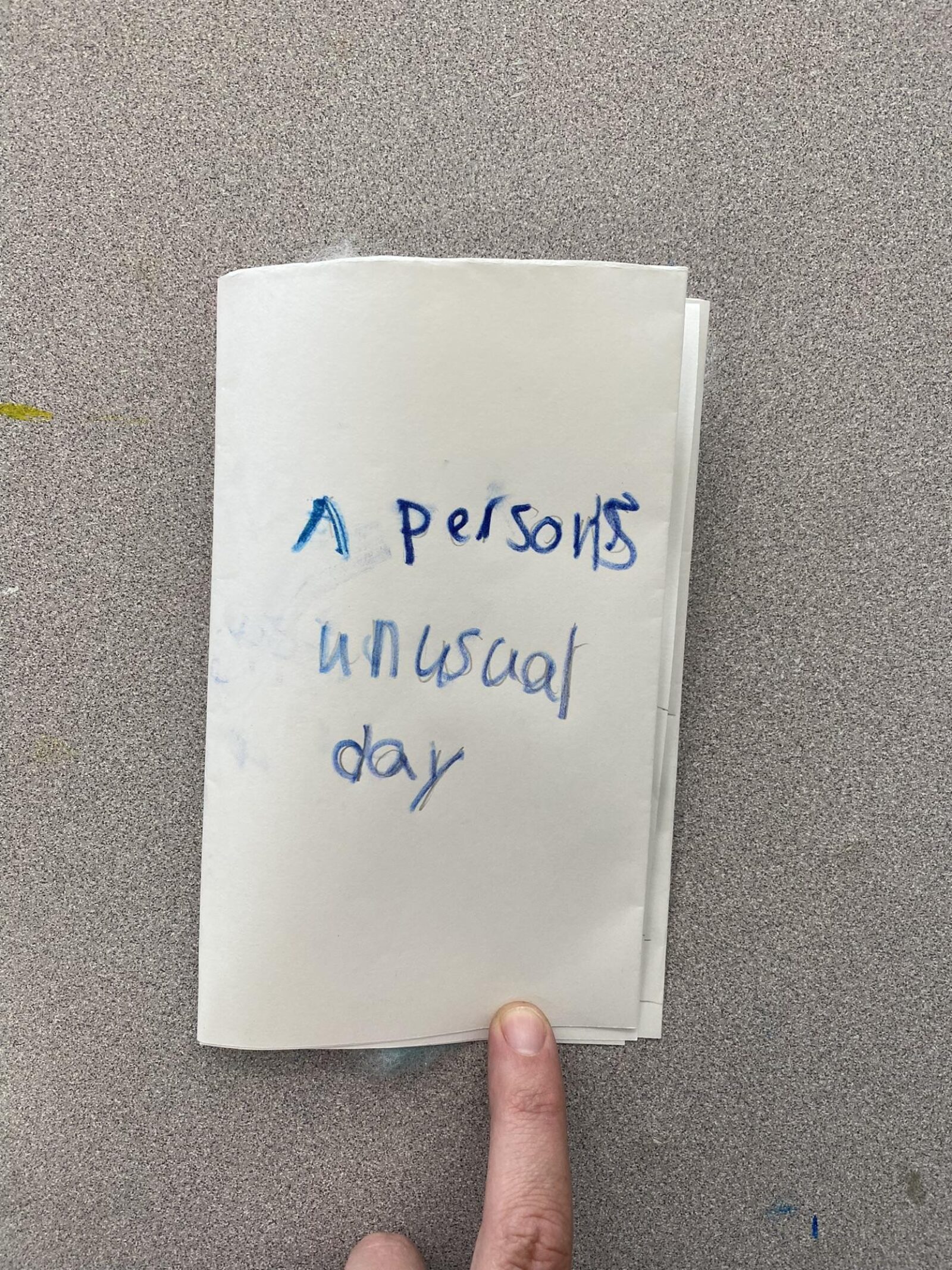  a child's handmade book called "a persons unusual day"