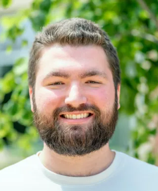 portrait of Joey Hartz smiling