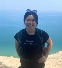 woman standing in front of water