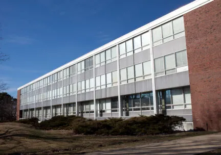 A photograph of the Art & Design building exterior on a sunny day