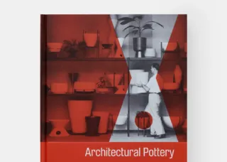 book cover mostly in red with many ceramic items pictured