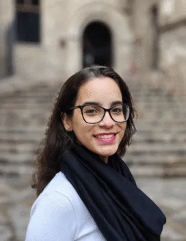 young woman in front of stairs