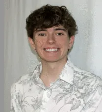 young man in white and gray shirt