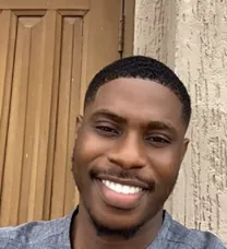 young man in blue shirt