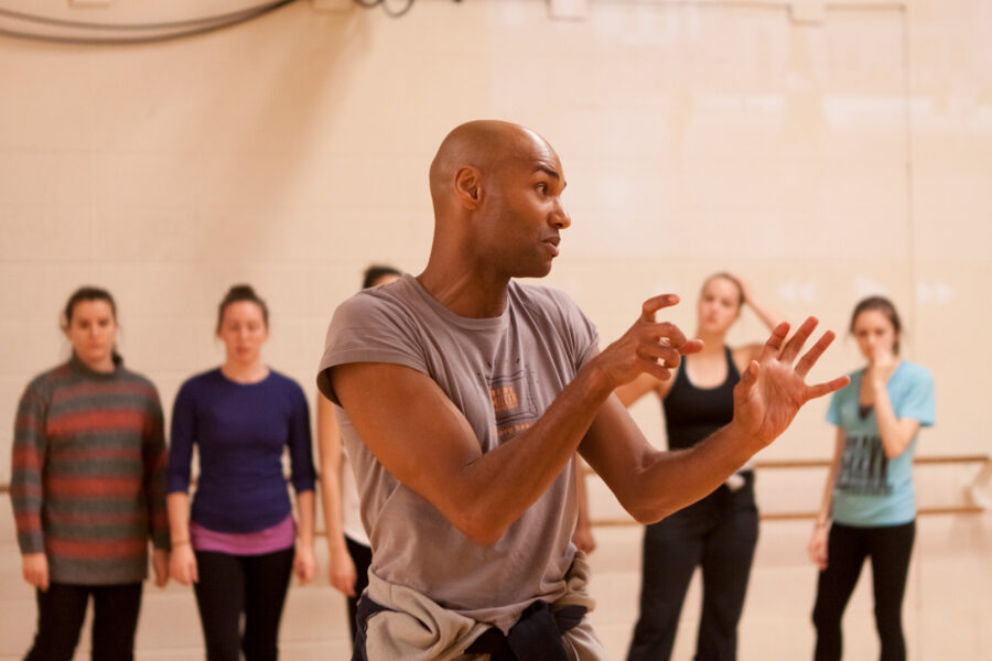 Darrell Jones instructing students behind him