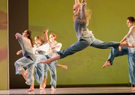 A dancer jumps through the air