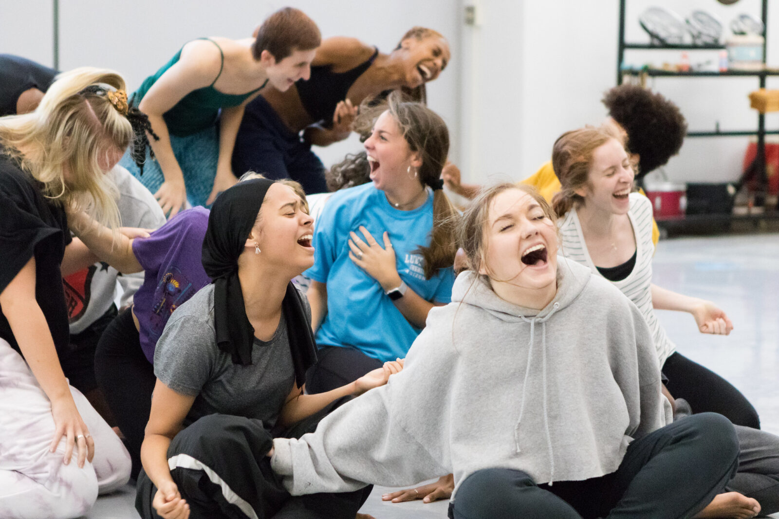 Group of dancers laughing