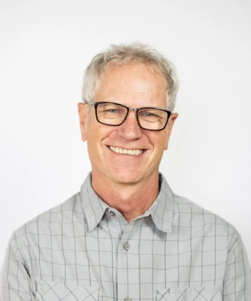 A headshot of John