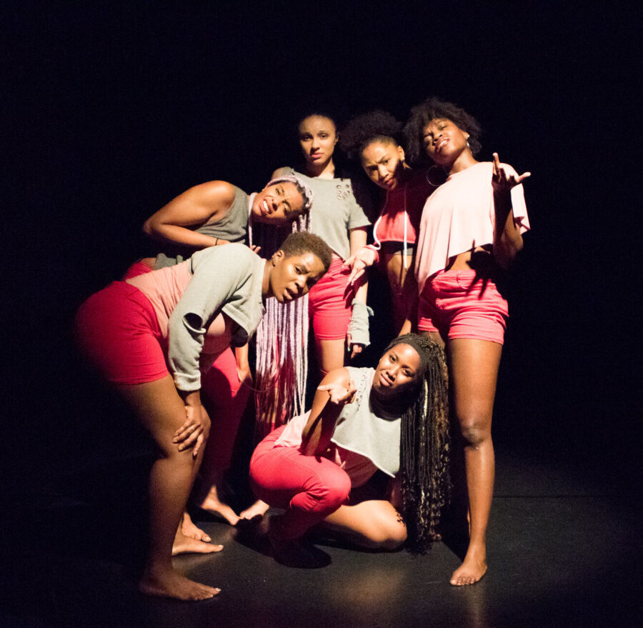 group of dancers looking at camera