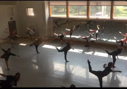 dancers balancing on one leg