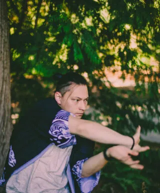 dancer outside in front of a tree