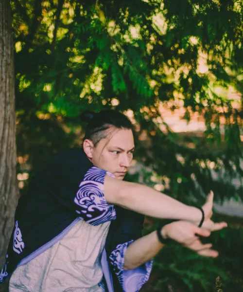 dancer outside in front of a tree