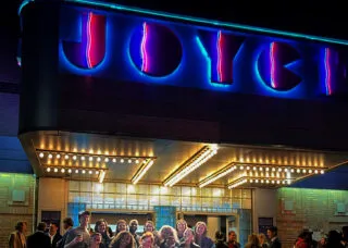 students in front of the Joyce Theatre
