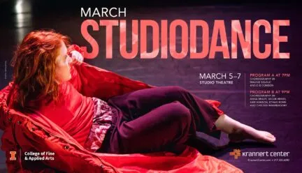 dancer lies on floor with red coat