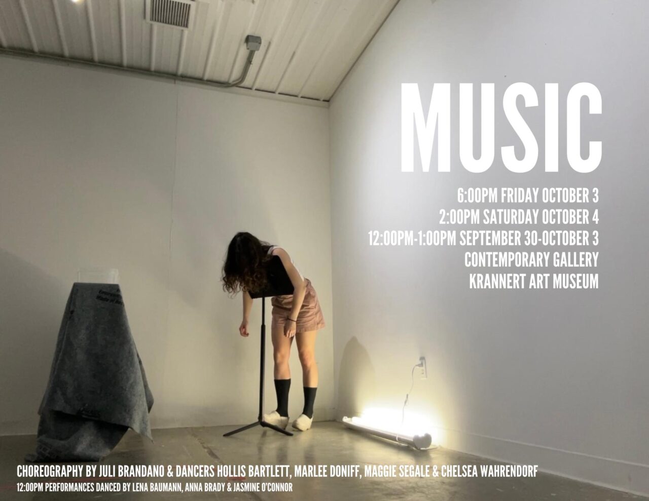 A female dancer is leaning on music stand