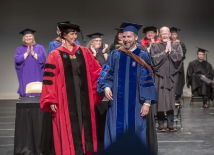 Student recieves doctorate at graduation