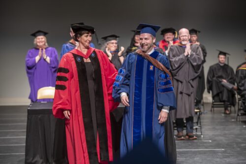 Student recieves doctorate at graduation