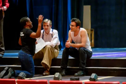 Director working with actors during rehearsal