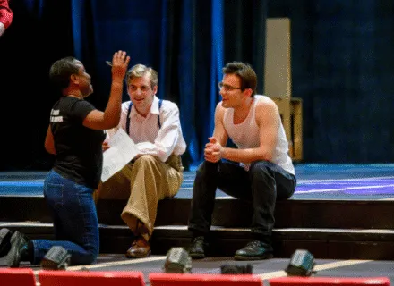 Director working with actors during rehearsal