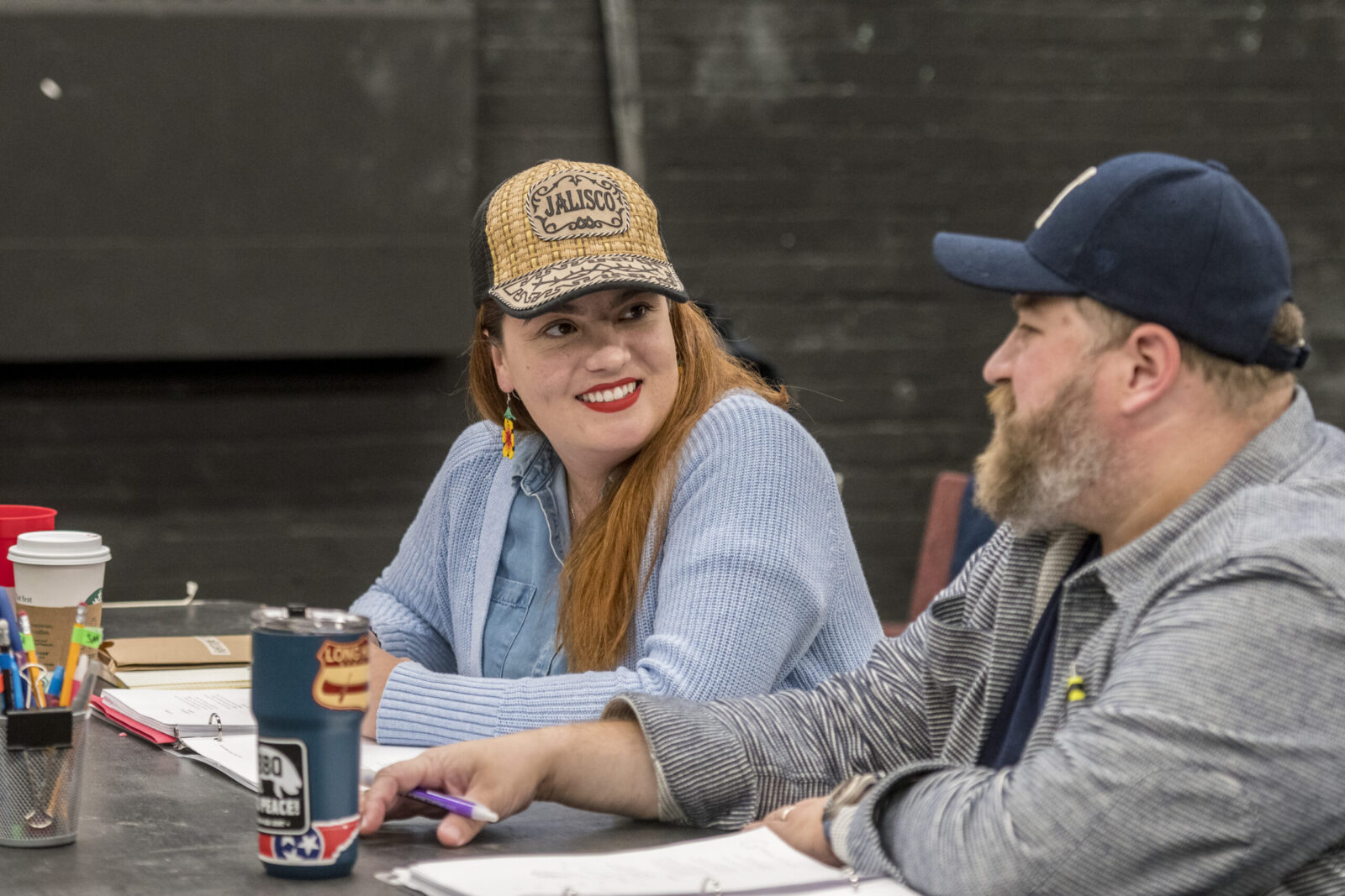 Playwright and director discuss rehearsal