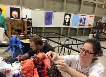 Two artists design dragon heads