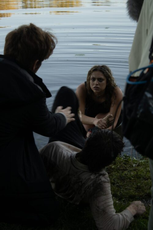 several people by a lake