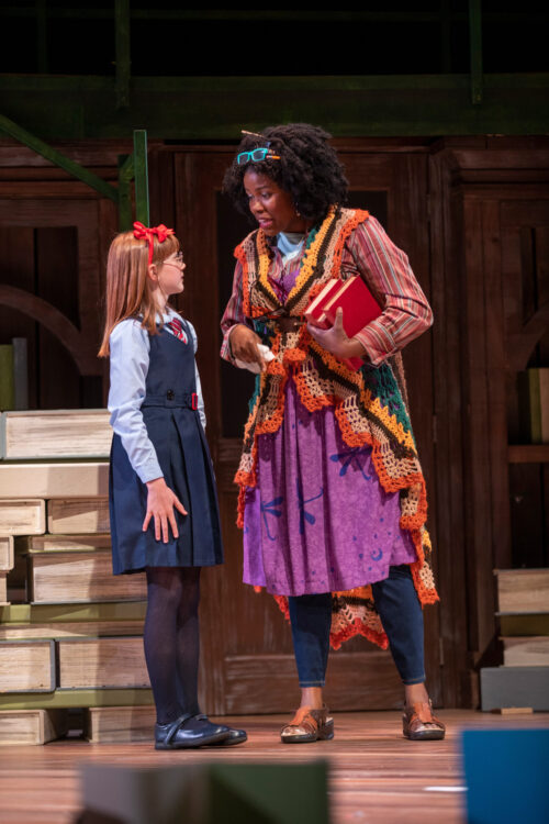 2 people onstage talking to one another
