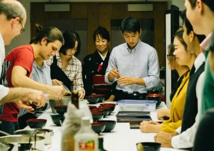 Jennifer Gunji-Ballsrud, director of Japan House, oversees work of students.