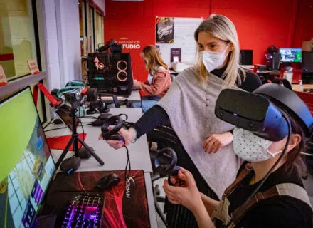 Fashion Design instructor Chiara Vincenzi, top, leads students in her fashion illustration class as they use new tools to create glamorous runway dresses in a virtual world.