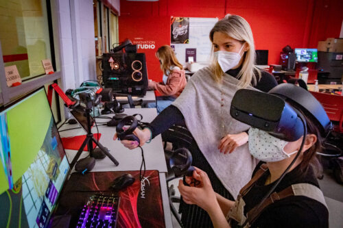 Fashion Design instructor Chiara Vincenzi, top, leads students in her fashion illustration class as they use new tools to create glamorous runway dresses in a virtual world.