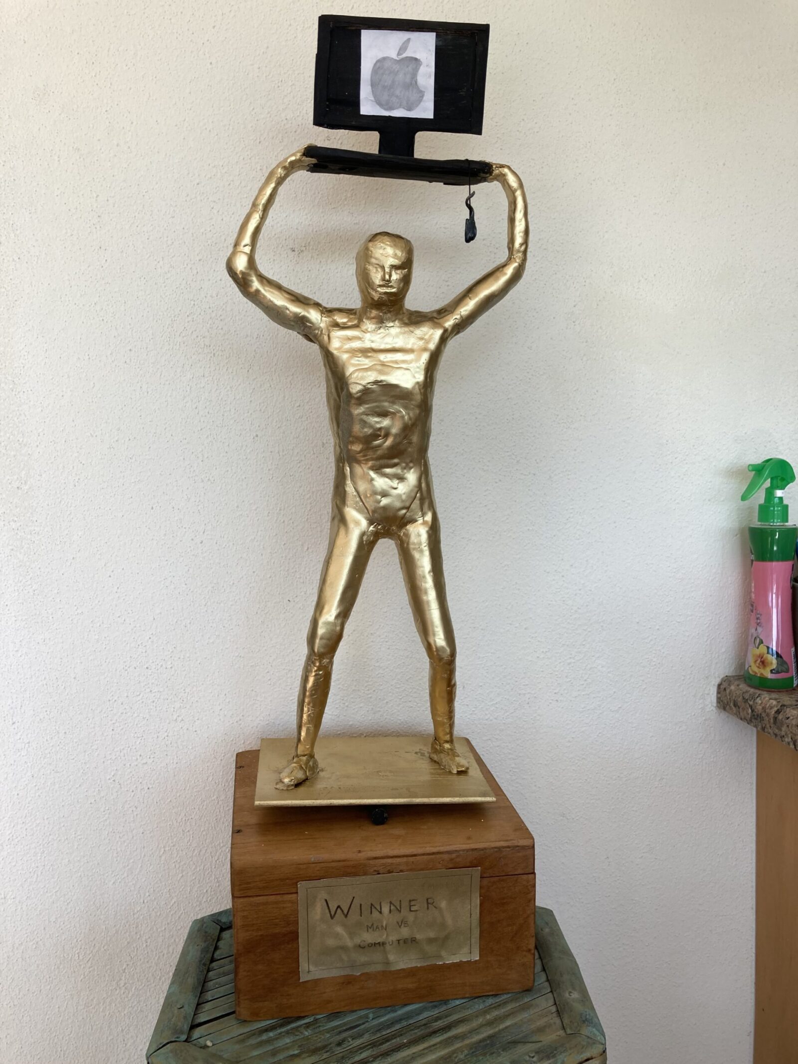 Rita created this "trophy" to symbolize her frustration and eventual triumph over technology challenges associated with returning for her degree. 