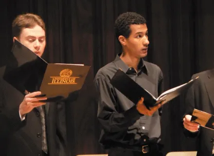 Hillman singing in the University of Illinois Concert Choir during commencement.