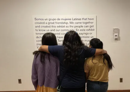 Girls reflecting on the exhibit