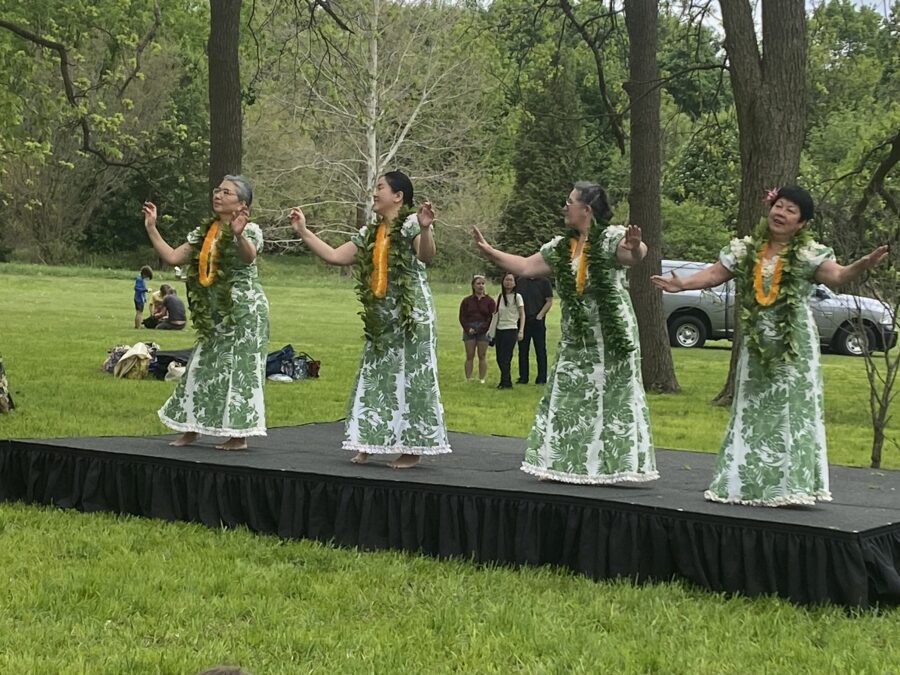 4 women dancing on stage